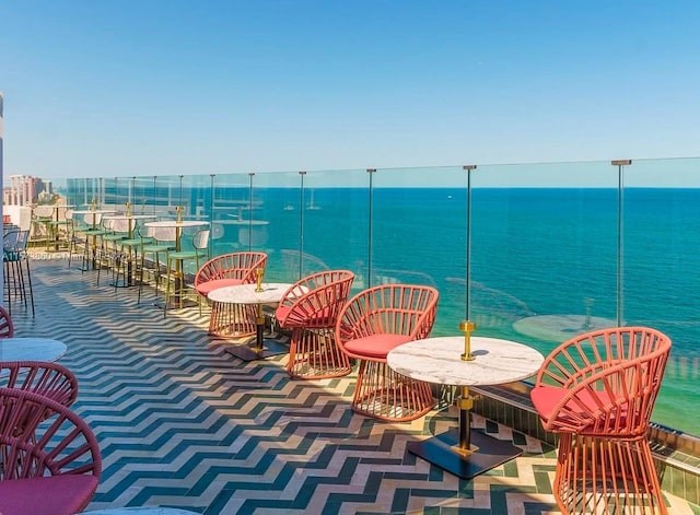 view of patio featuring a water view