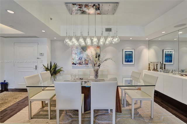 dining room with hardwood / wood-style flooring