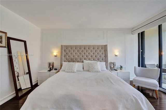 bedroom featuring dark wood-type flooring