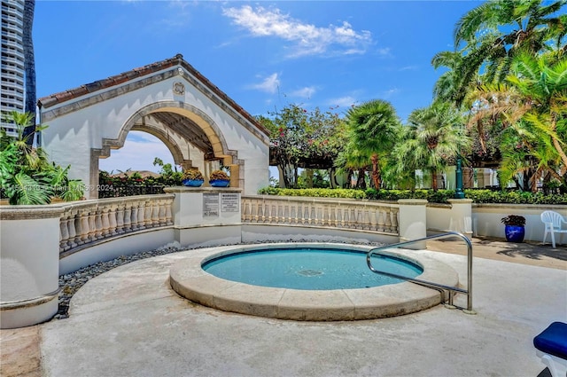 view of swimming pool with a patio area