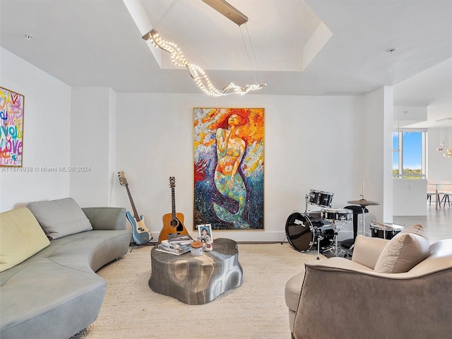 living room featuring a notable chandelier