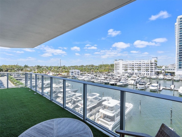 balcony featuring a water view