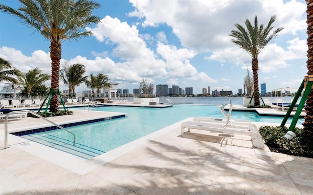 view of pool featuring a patio area