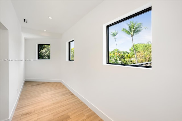 unfurnished room featuring light hardwood / wood-style floors