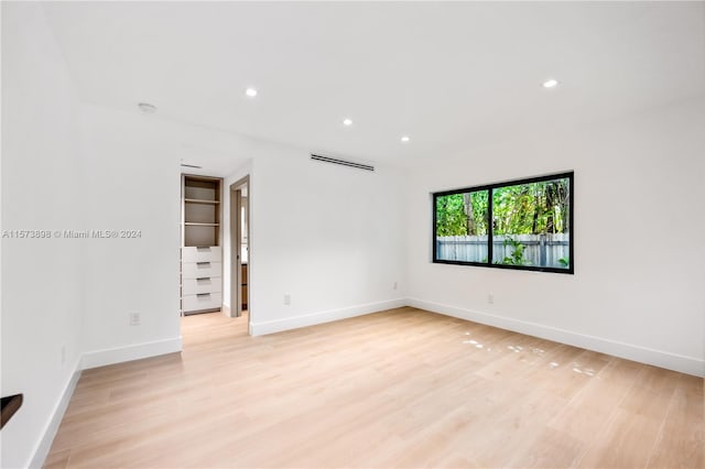 empty room with light wood-type flooring