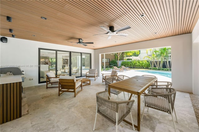 view of patio with ceiling fan and outdoor lounge area