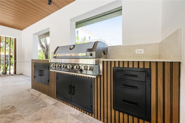 interior space featuring wooden ceiling and tile floors