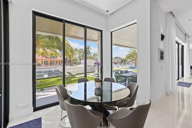 dining room featuring light tile flooring