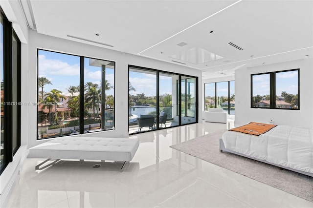 tiled bedroom featuring access to exterior