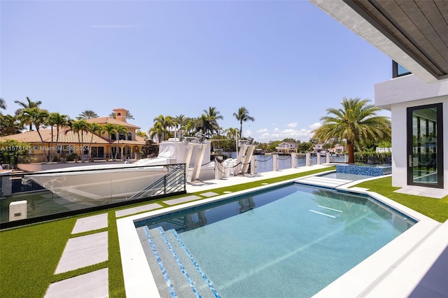 view of pool featuring a patio