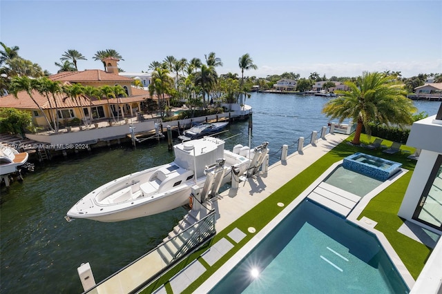 dock area with a water view