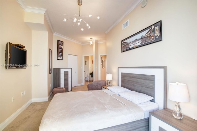 carpeted bedroom featuring ornamental molding and an inviting chandelier