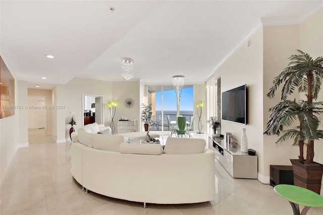 living room with a wall of windows, light tile flooring, a chandelier, and ornamental molding