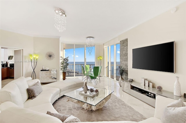 living room featuring expansive windows, crown molding, a water view, an inviting chandelier, and tile flooring