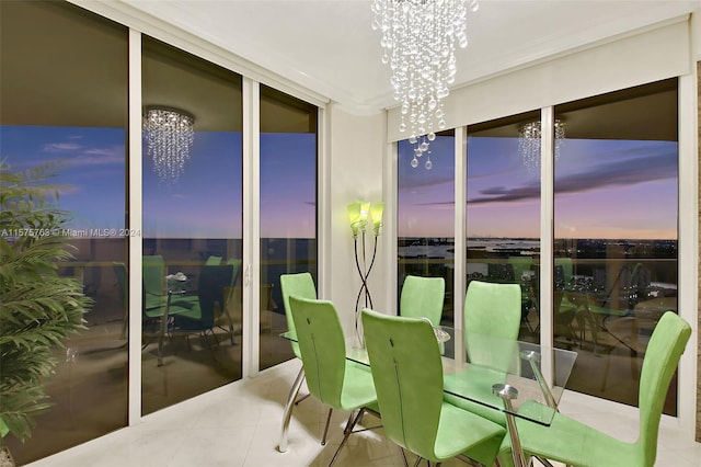 sunroom with a chandelier