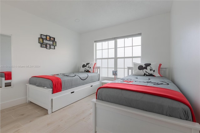 bedroom featuring light hardwood / wood-style floors