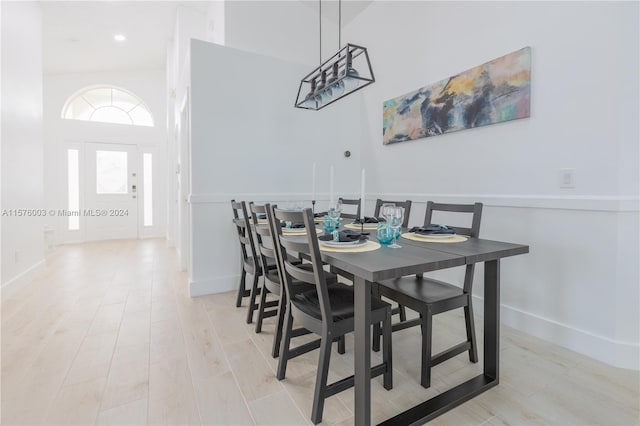 dining area with light wood-type flooring