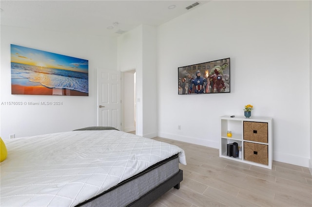 bedroom featuring light hardwood / wood-style flooring