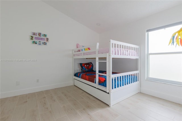 bedroom with light hardwood / wood-style floors