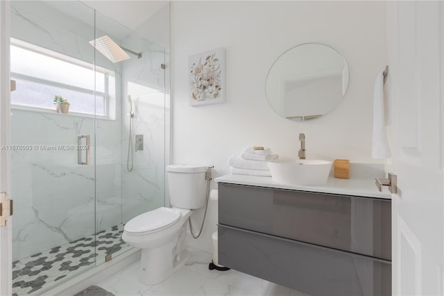 bathroom with tile patterned floors, vanity, walk in shower, and toilet