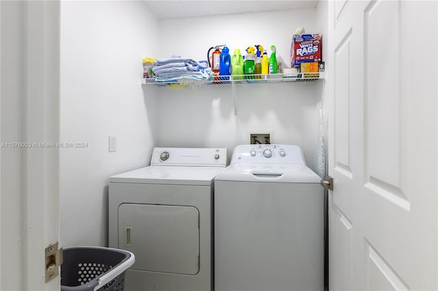 washroom with washer and clothes dryer