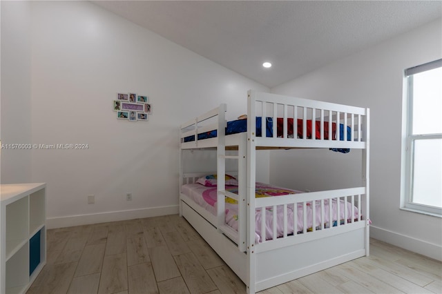 bedroom featuring light hardwood / wood-style floors