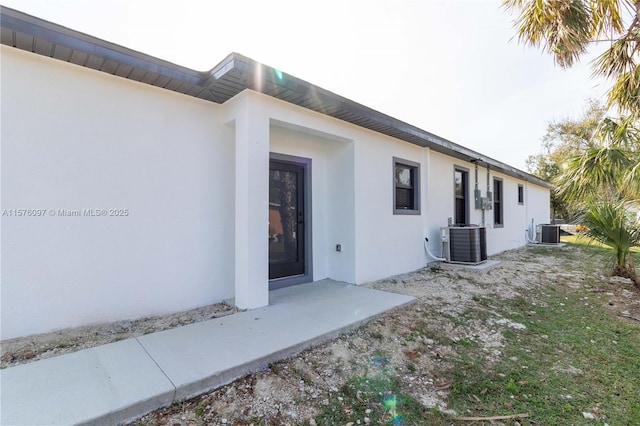 exterior space featuring central AC unit