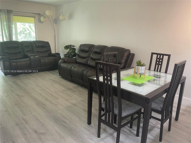 dining room featuring light hardwood / wood-style flooring