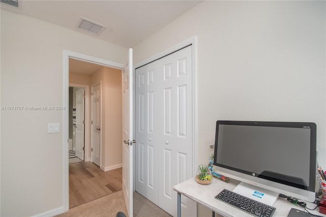 home office featuring light hardwood / wood-style flooring