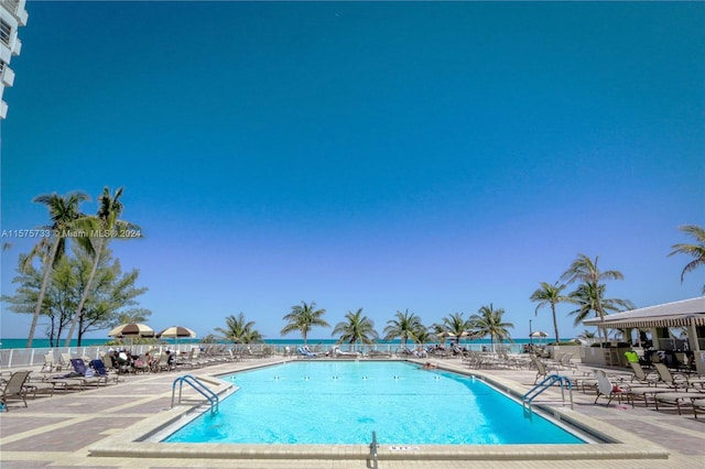 view of pool featuring a patio area