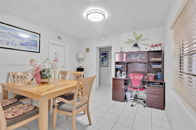 view of tiled dining room