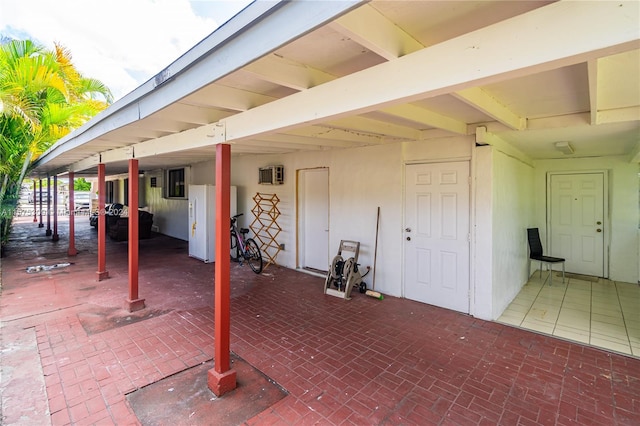 view of terrace with a carport