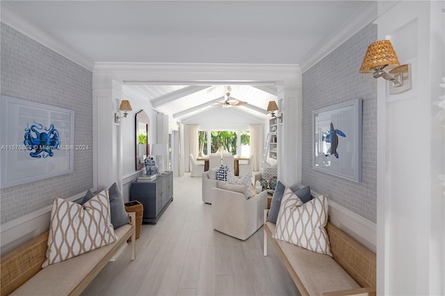 interior space featuring hardwood / wood-style floors, lofted ceiling, ornamental molding, and brick wall