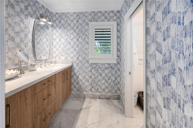 bathroom featuring ornamental molding, tile flooring, vanity, and tile walls