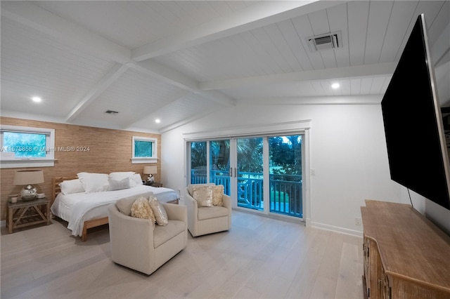 bedroom with wooden walls, light hardwood / wood-style flooring, access to exterior, and vaulted ceiling with beams