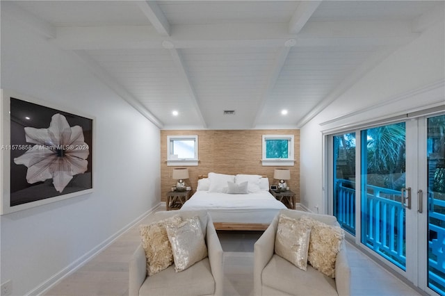 bedroom with vaulted ceiling with beams, hardwood / wood-style flooring, and access to exterior