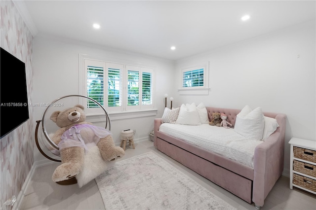 bedroom with crown molding