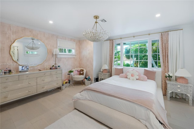 bedroom with a chandelier and crown molding