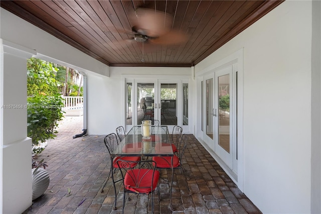 view of terrace featuring french doors and ceiling fan