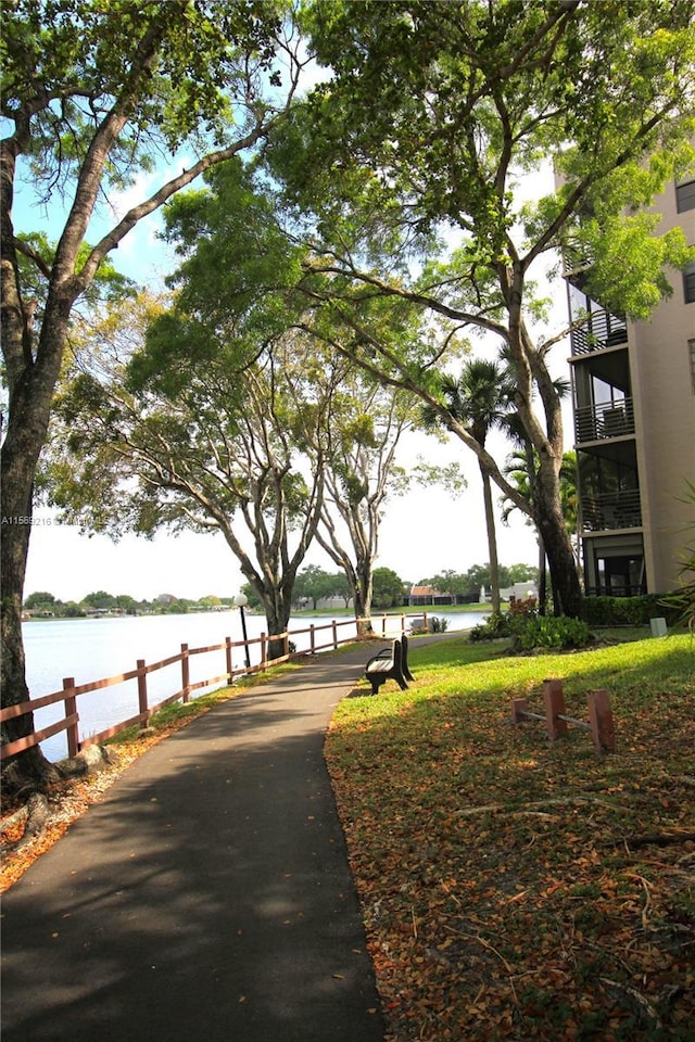 view of community with a water view