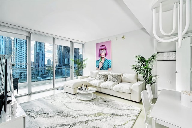 living room featuring plenty of natural light and a wall of windows