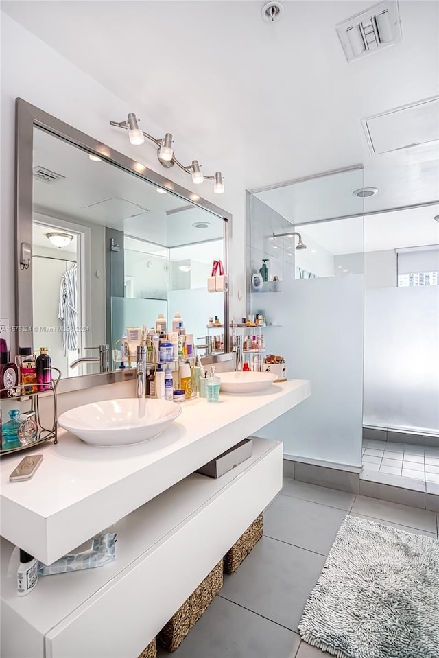 bathroom with tile floors and large vanity