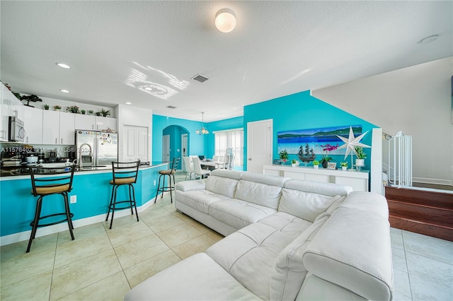 living room with light tile floors