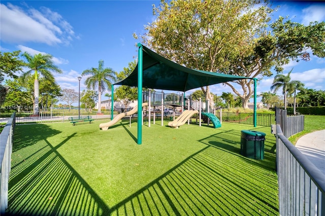 view of jungle gym with a yard