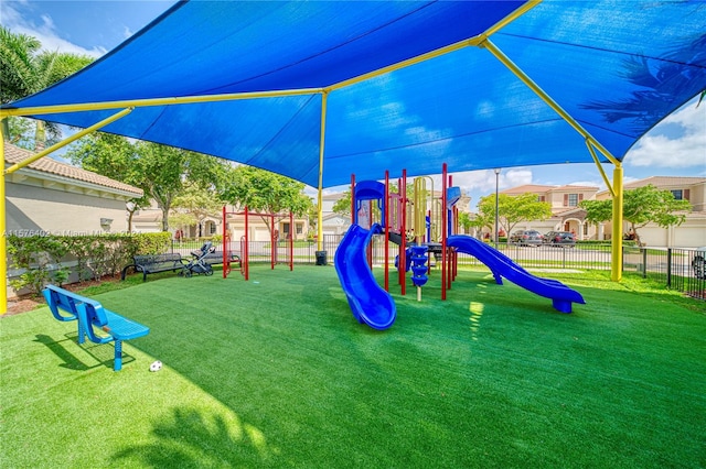 view of playground featuring a yard