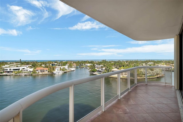 balcony featuring a water view