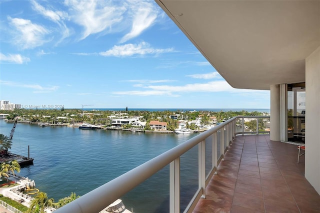 balcony featuring a water view