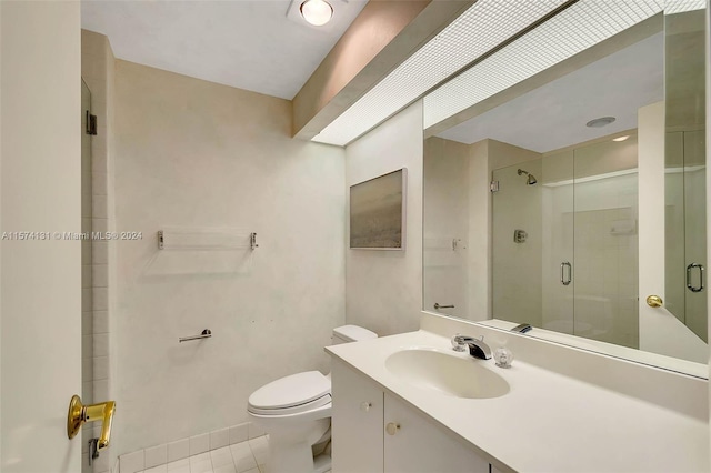 bathroom featuring a shower with door, toilet, tile patterned flooring, and vanity