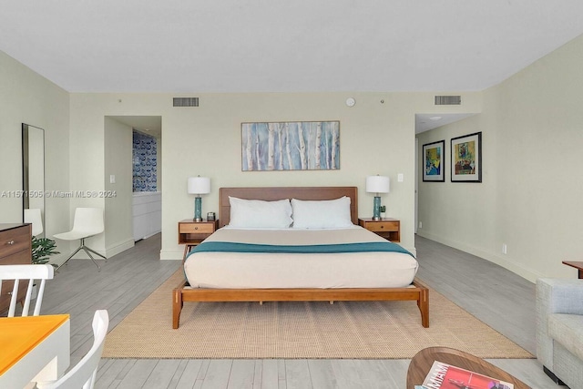 bedroom featuring light wood-type flooring