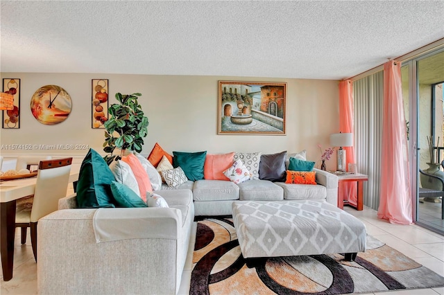 tiled living room with a textured ceiling